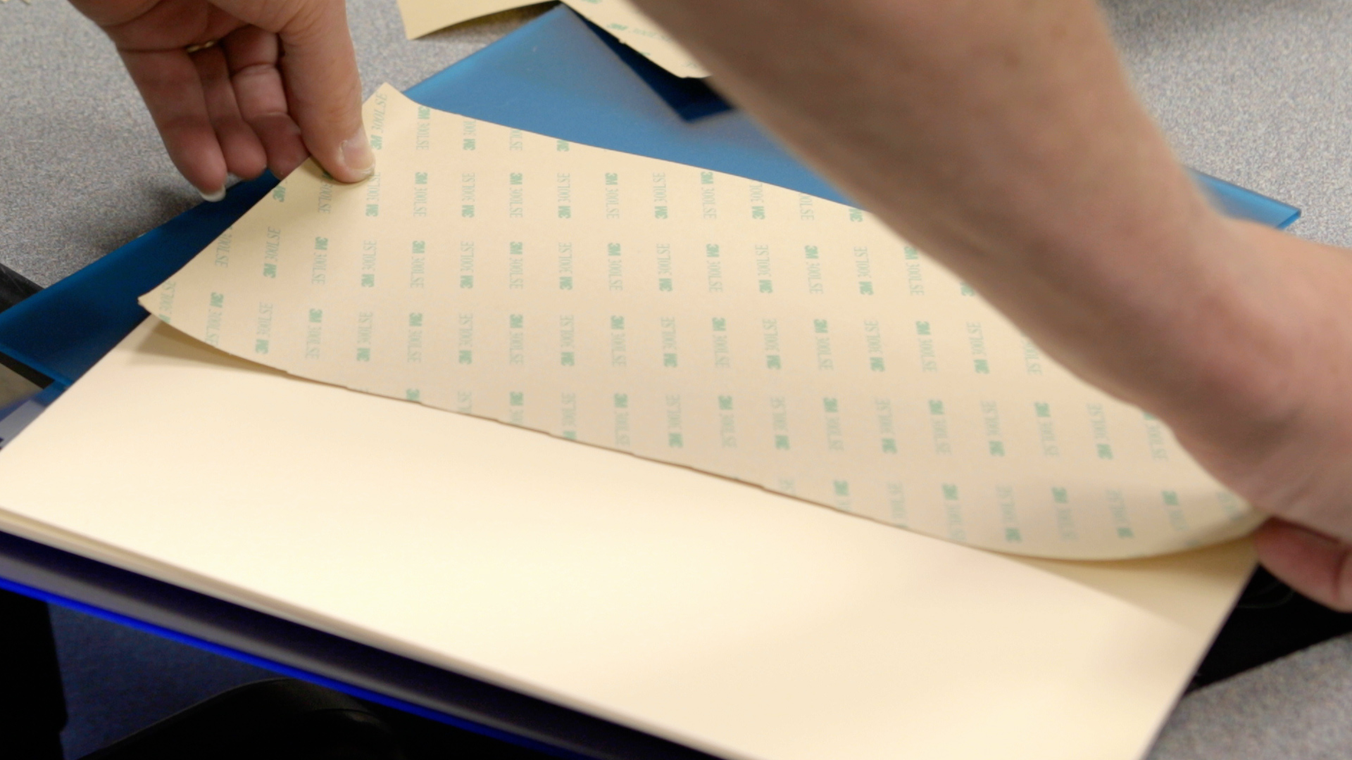 adhesive backing on acrylic